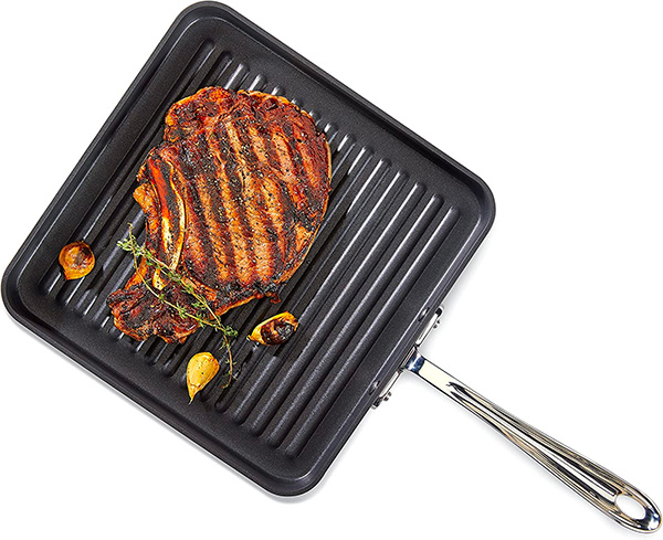 all clad grill pan with steak in it