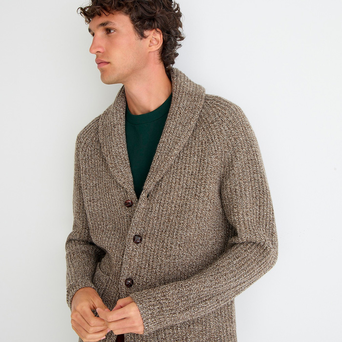 man wearing a tan shawl collar cardigan from J.Crew