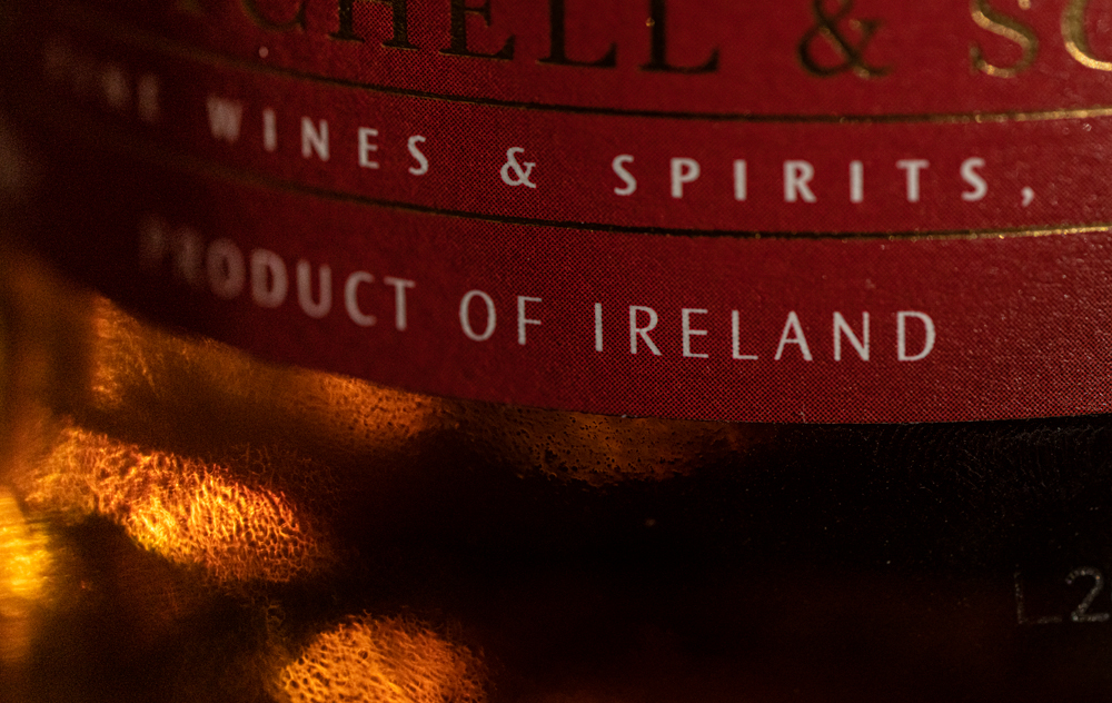 whiskey bottle label that says product of ireland