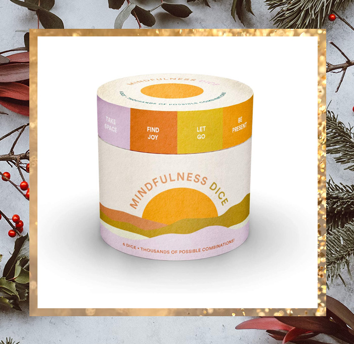 a set of dice featuring messages encouraging mindfulness practices