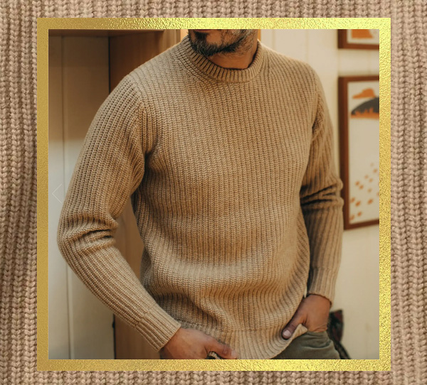 a person wearing a double knit crew neck long sleeve sweater