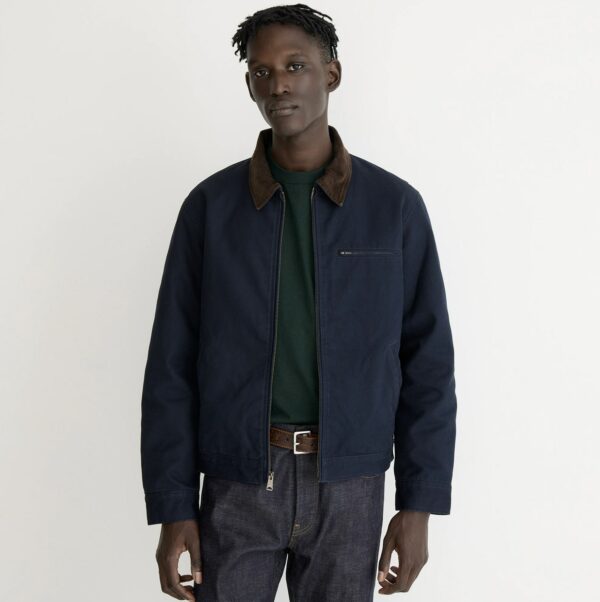 a man wearing a canvas work jacket