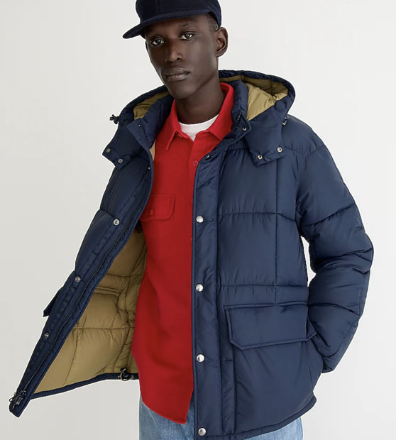 man wearing medium blue puffer jacket