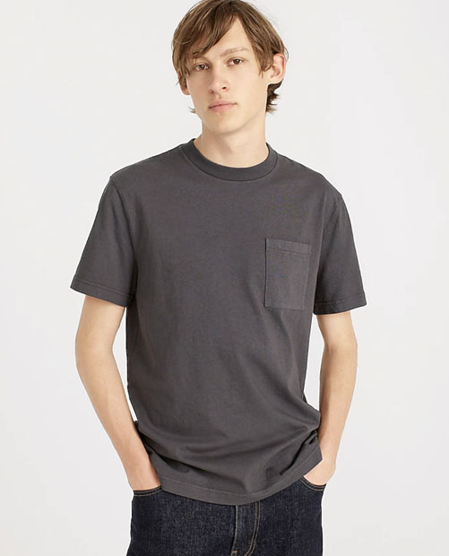 man wearing faded black pocket t-shirt