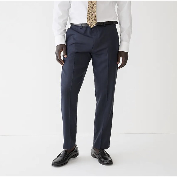 a person wearing stretch wool suit pants