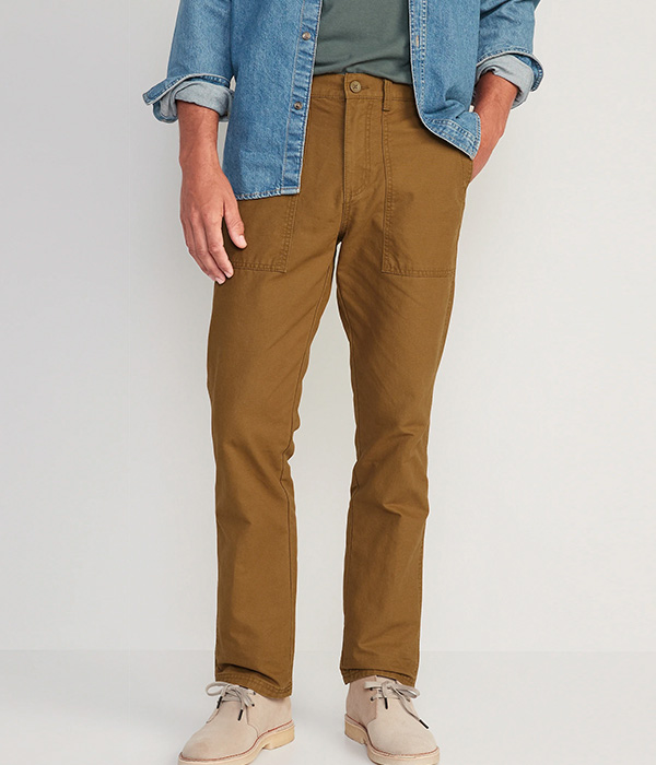 a person wearing canvas work wear pants