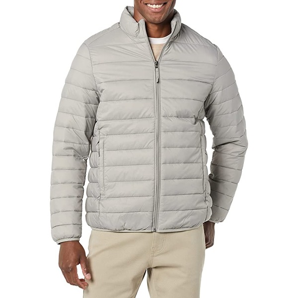 a man wearing a zip front packable puffer jacket