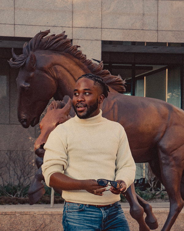 man wearing roll neck sweater