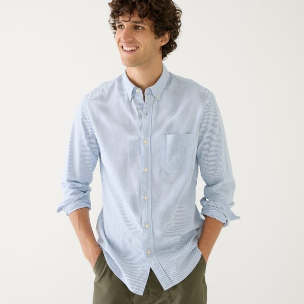 man wearing a button front oxford style shirt