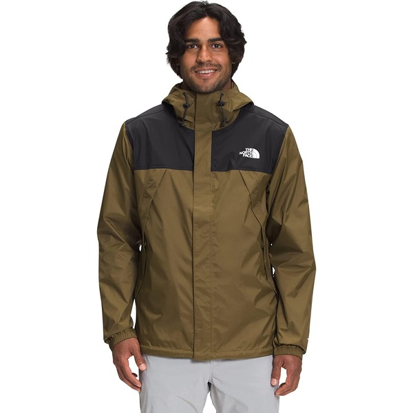 a man wearing a north face brand nylon light jacket