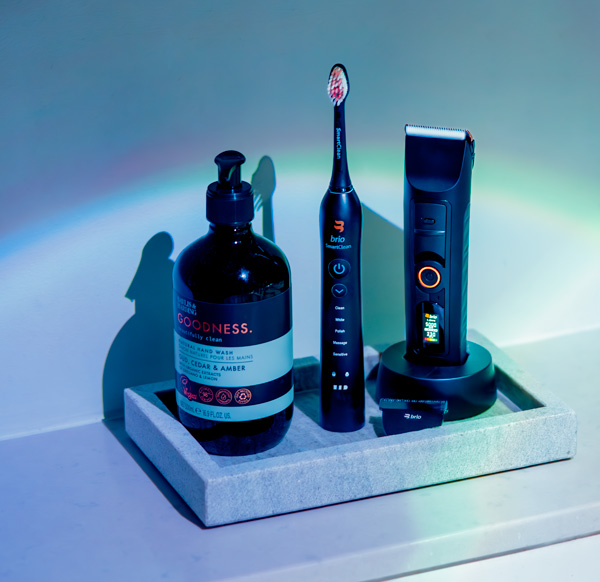 bathroom counter tray with brio beardscape, brio toothbrush, and soap