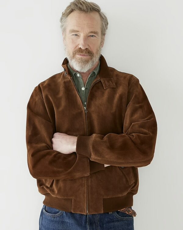 a man wearing a harrington style suede jacket
