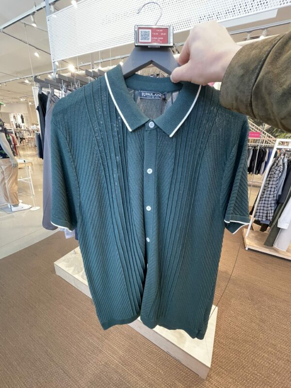 a short sleeve button front polo style shirt