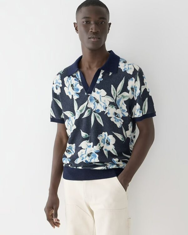 a man wearing a floral print knit polo shirt