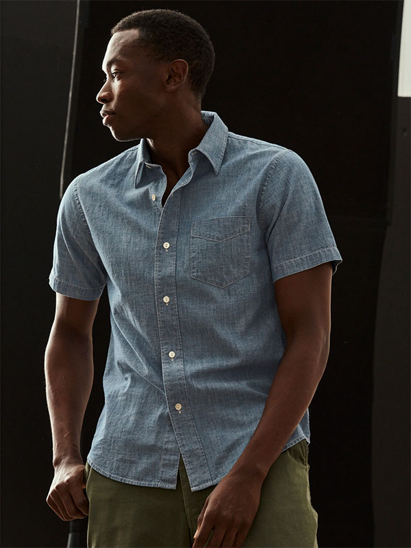 man wearing buck mason short sleeve shirt