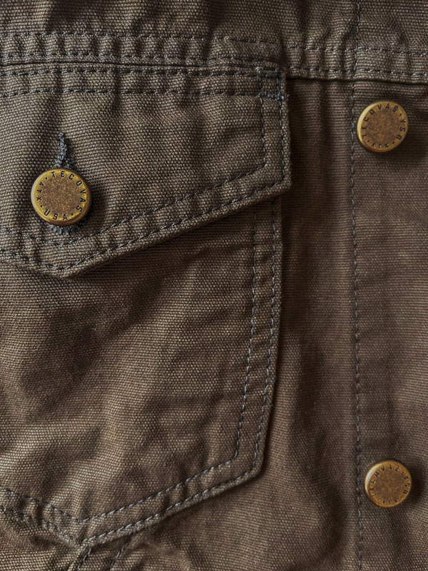 close up of waxed canvas jacket
