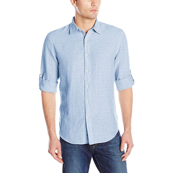 a man wearing a button front linen shirt with sleeves rolled