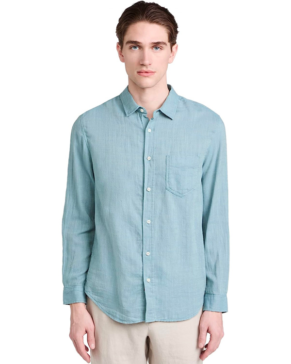man wearing a long sleeve button front linen shirt