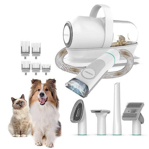 a pet grooming kit with vacuum and shedding tools