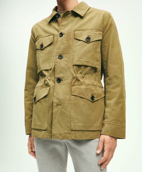 a man wearing a ripstop field jacket