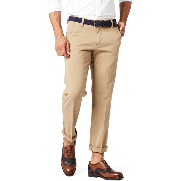 a man wearing slim fit khaki pants