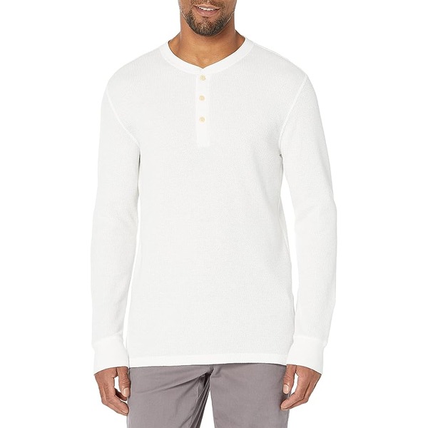 a man wearing a waffle stitch long sleeve henley shirt