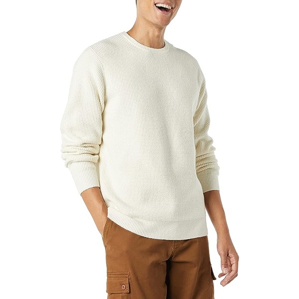 a man wearing a waffle stich long sleeve shirt and pants