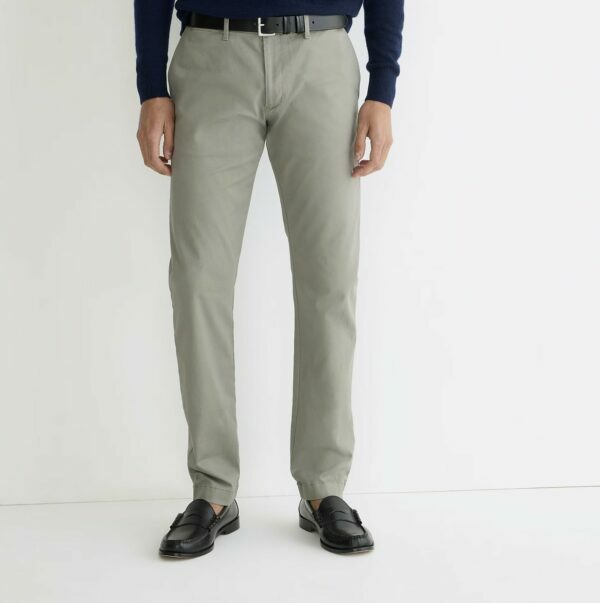 man wearing chino pants and dress shoes