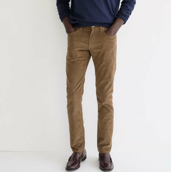 a man wearing corduroy pants with dress shoes