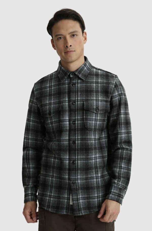 man wearing a wool plaid pattern shirt