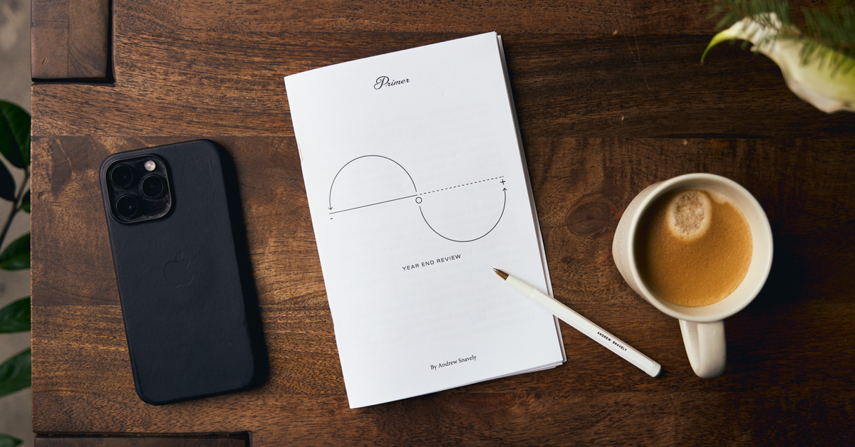 A year end review template journal on a desk