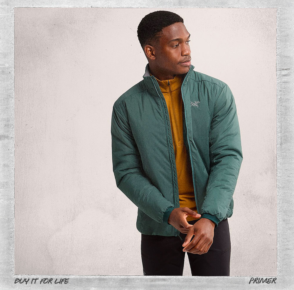 man wearing green jacket