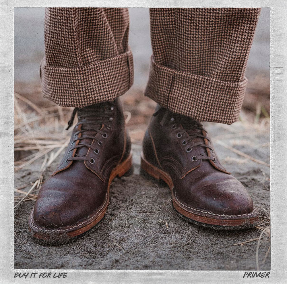 man wearing brown whites boots