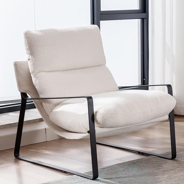 a mid century sherpa fabric arm chair