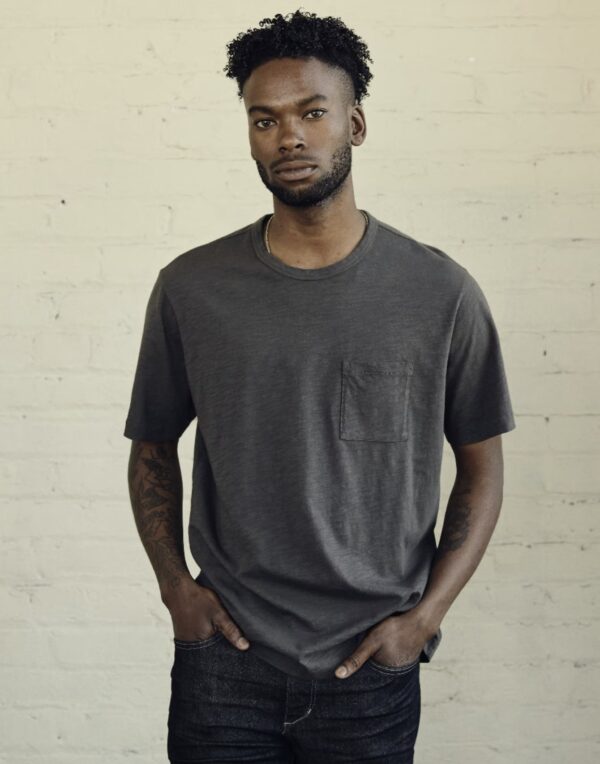 a man wearing a slub short sleeve one pocket shirt