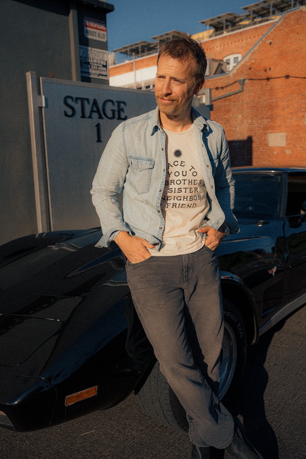 andrew wearing a denim shirt