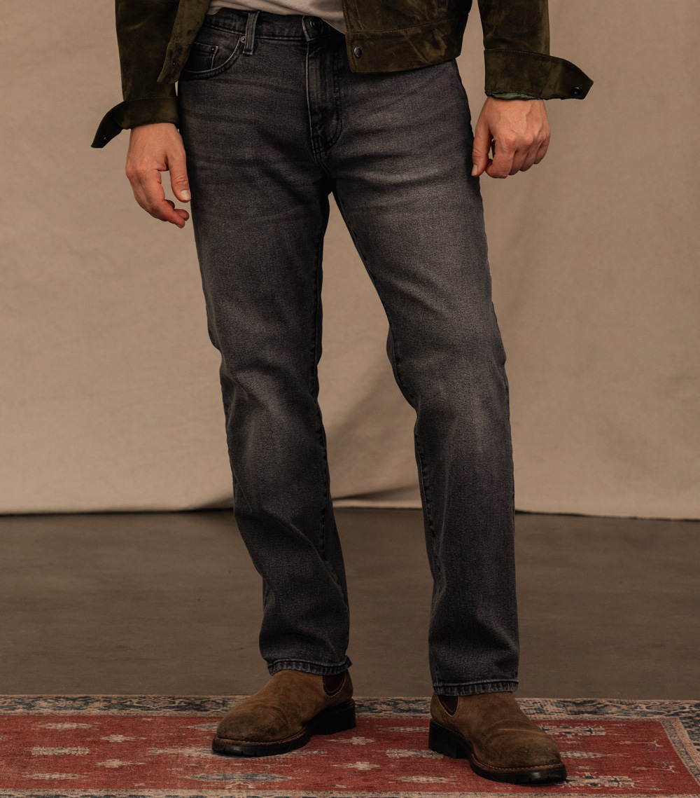 close up of faded black jeans