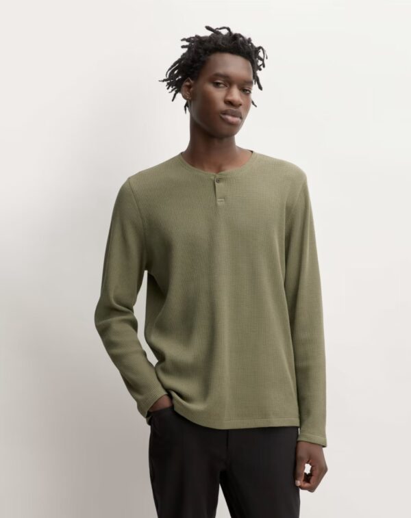 man wearing a long sleeve waffle knit henley shirt
