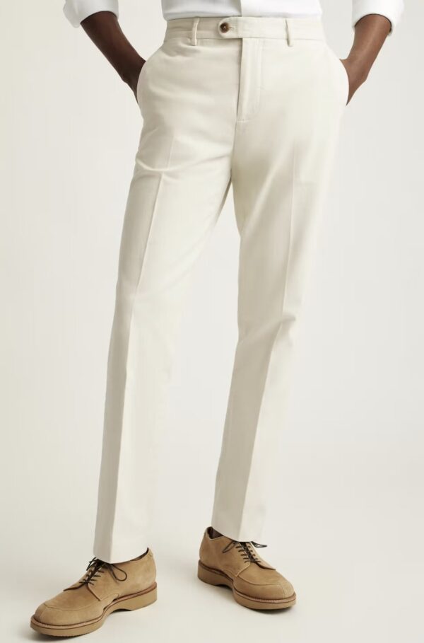 a man wearing dress chino pants