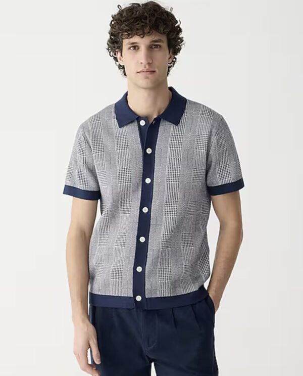 a man wearing a short sleeved button front polo shirt