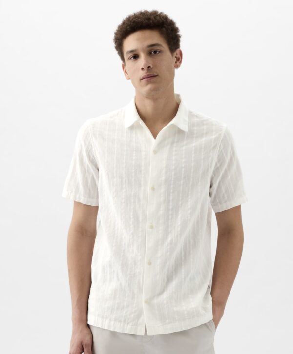 a man wearing a textured short sleeve button front shirt