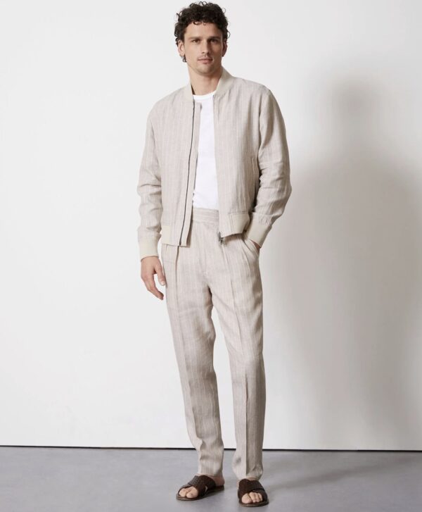 a man wearing an Italian linen casual style suit