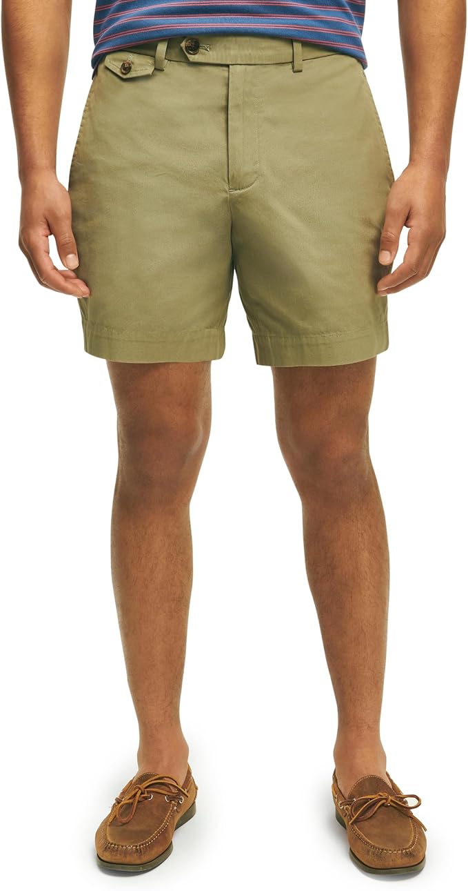man wearing tan shorts with an extended waist tab