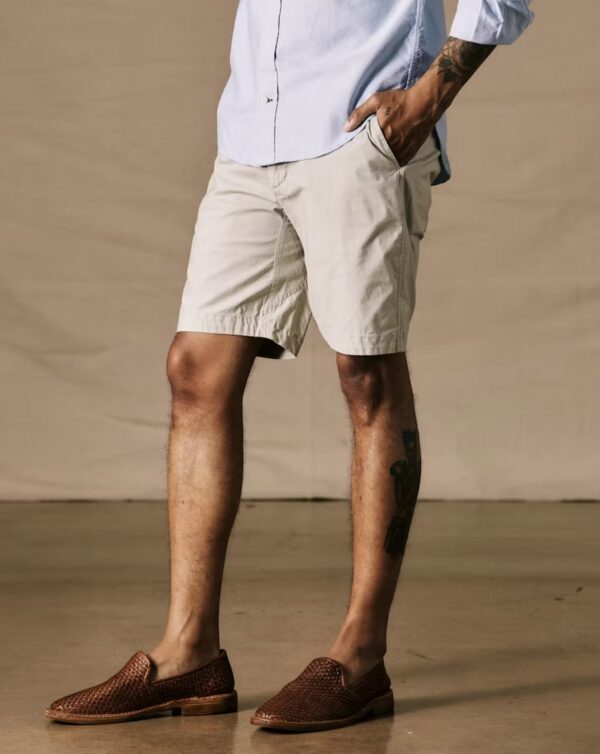 man wearing lightweight stretch casual shorts with slip on shoes