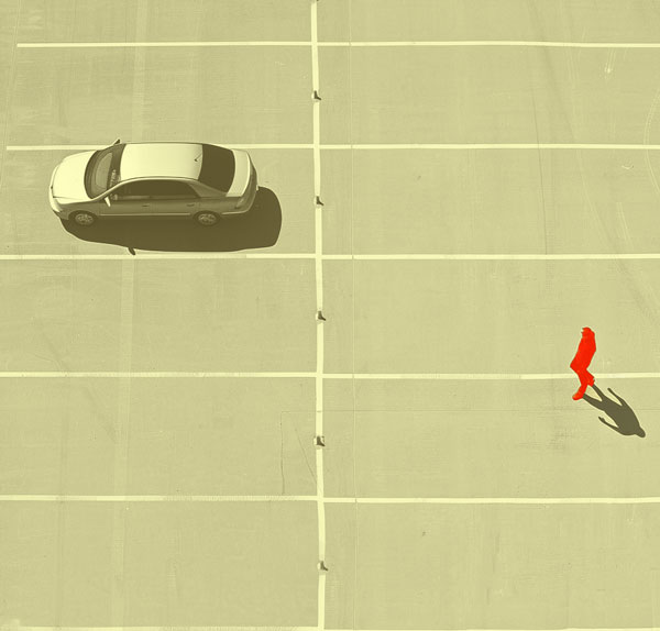 illustration of a man who is far away in a parking lot