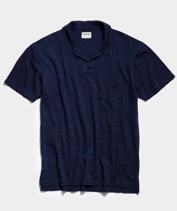 worn indigo polo