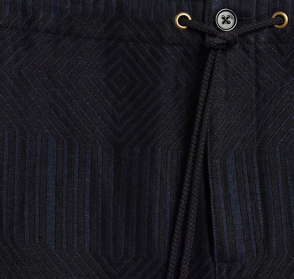 close up of geometric pattern on shorts