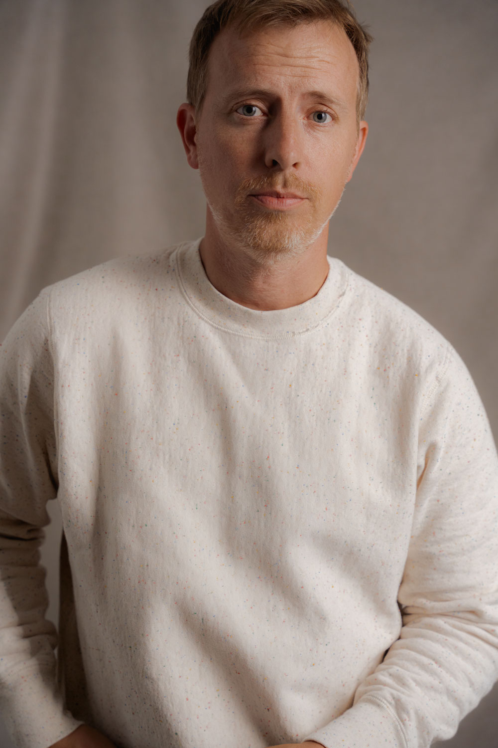 Andrew wearing Gustin rainbow nep heavyweight sweatshirt