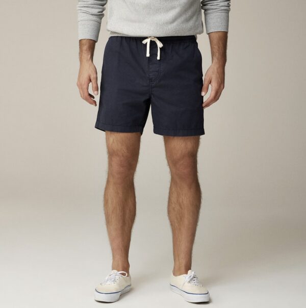 a man wearing drawstring waist dock shorts with casual shoes