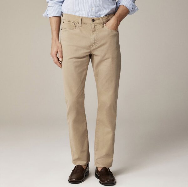 a man wearing straight fit pants with loafer shoes